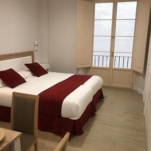 Kamer met een Queen Size Bed